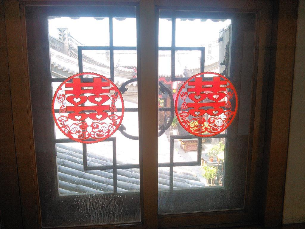 Pingyao Yucheng Yuan Inn Стая снимка